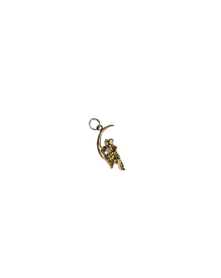 Antique C.P.S. Gold Charm of a couple sitting on a crescent moon